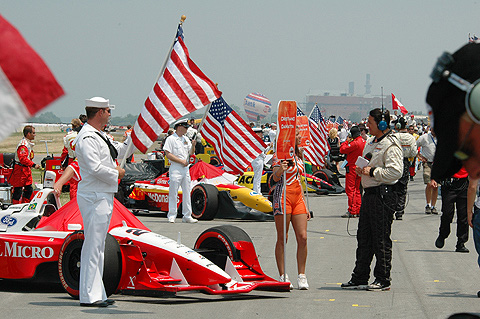Cars, Grid Girls, and Flags Lineup Before Race