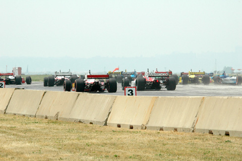 Field Pours Into Turn One