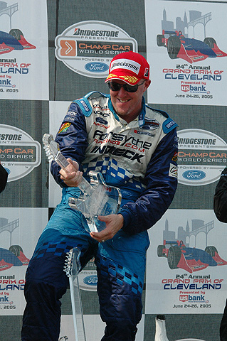 Paul Tracy Playing Air Guitar w/Trophy