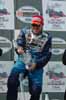 Paul Tracy Playing Air Guitar w/Trophy Thumbnail