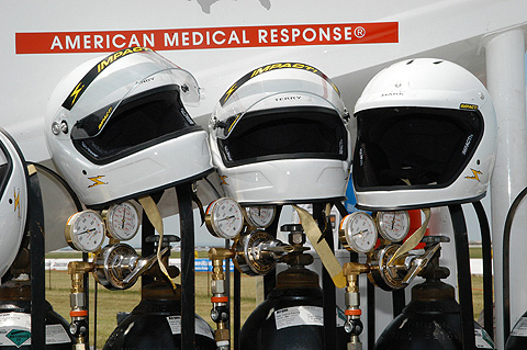 Pit Crew Helmets On Nitrogen Gas Bottles