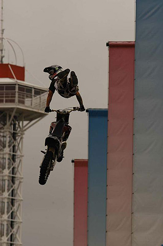 Motorcycle Daredevil Flying Through Air