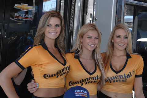 Three Continental Tire Girls with Short Tops