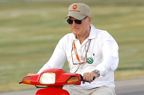 Paul Newman Riding Scooter