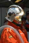 Sky Reflection off Fuel Man Helmet Thumbnail