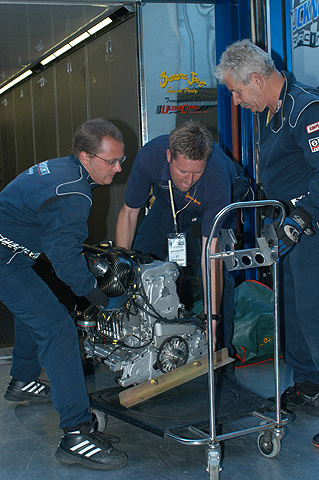 Intersport Crew Members Lifting Engine
