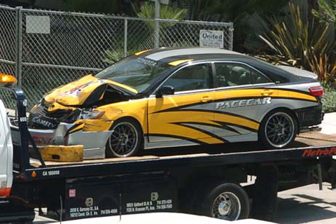 Damaged Pacecar On Back Of Flatbed