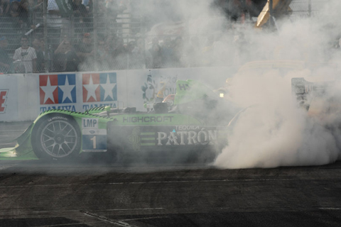 Simon Pagenaud in an HPD ARX-01c Celebrating Victory w/Donuts