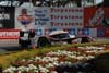 Aston Martin Lola Coupe B08 62 LMP1 Going by Flowerbed Thumbnail