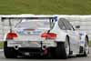 Damaged Rear of BMW E92 M3 GT2 Driven by Joey Hand and Bill Auberlen in Action Thumbnail