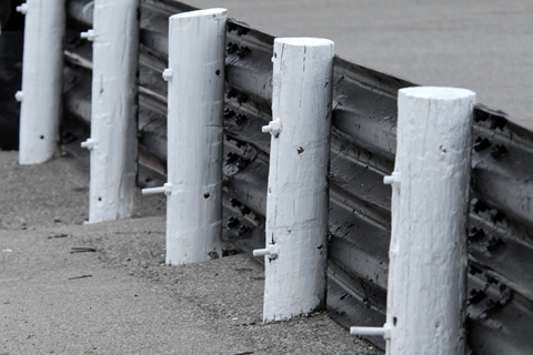 Wooden Posts Holding Up Guardrail