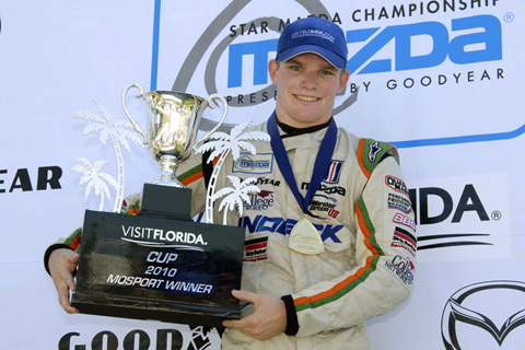 Star Mazda Winner Conor Daly Holds Trophy
