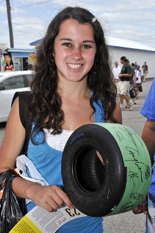 Girl With Wrapped Go Kart Tire for Autographs