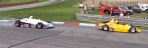Goulart leading smoking Stewart in F500 Race