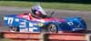 Winner John Black w/Checkered Flag in SRF Race Thumbnail