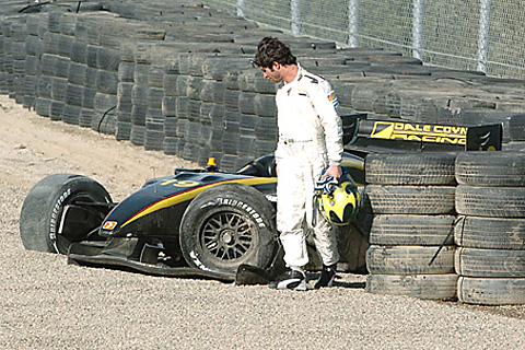 Bruno Junqueira Looks At Crashed Car