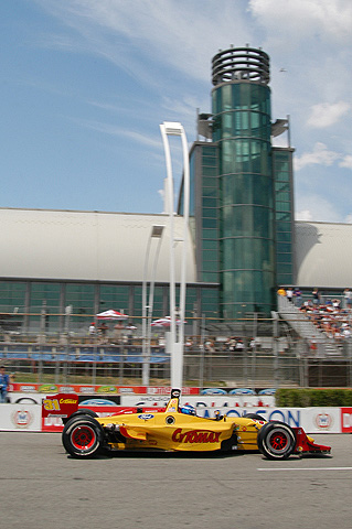 Ryan Hunter-Reay in Action w/Convention Center in Background