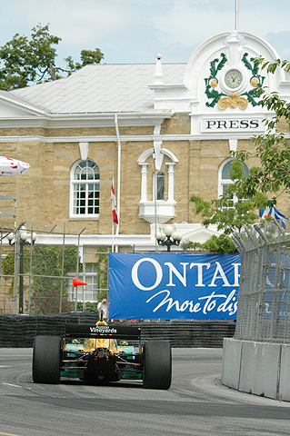 Champ Car w/Local Building in Background