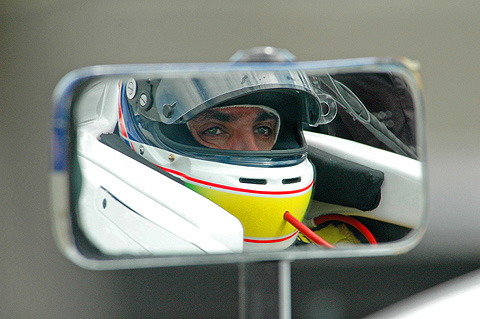 Justin Wilson's Reflection in Side View Mirror