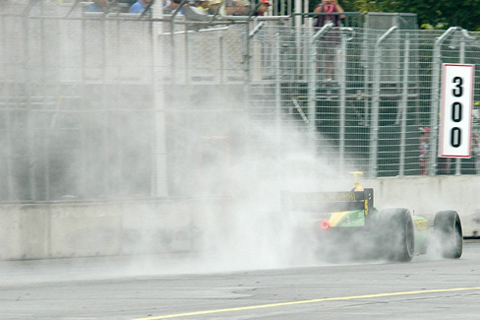 Will Power Kicking Up Rooster Tail of Spray