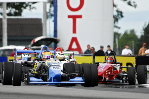 Chris Miller Leading a Group of Cars