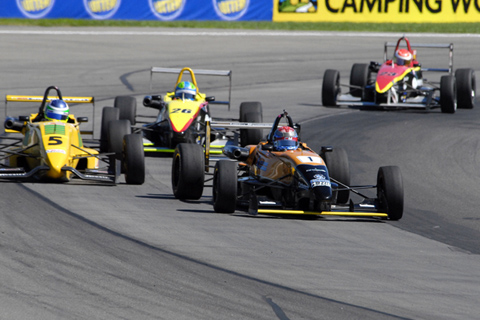 Cole Mogan Leading A Pack of Cars