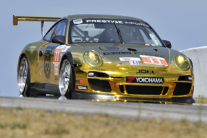 JDX Racing Gold Porsche in Action Image